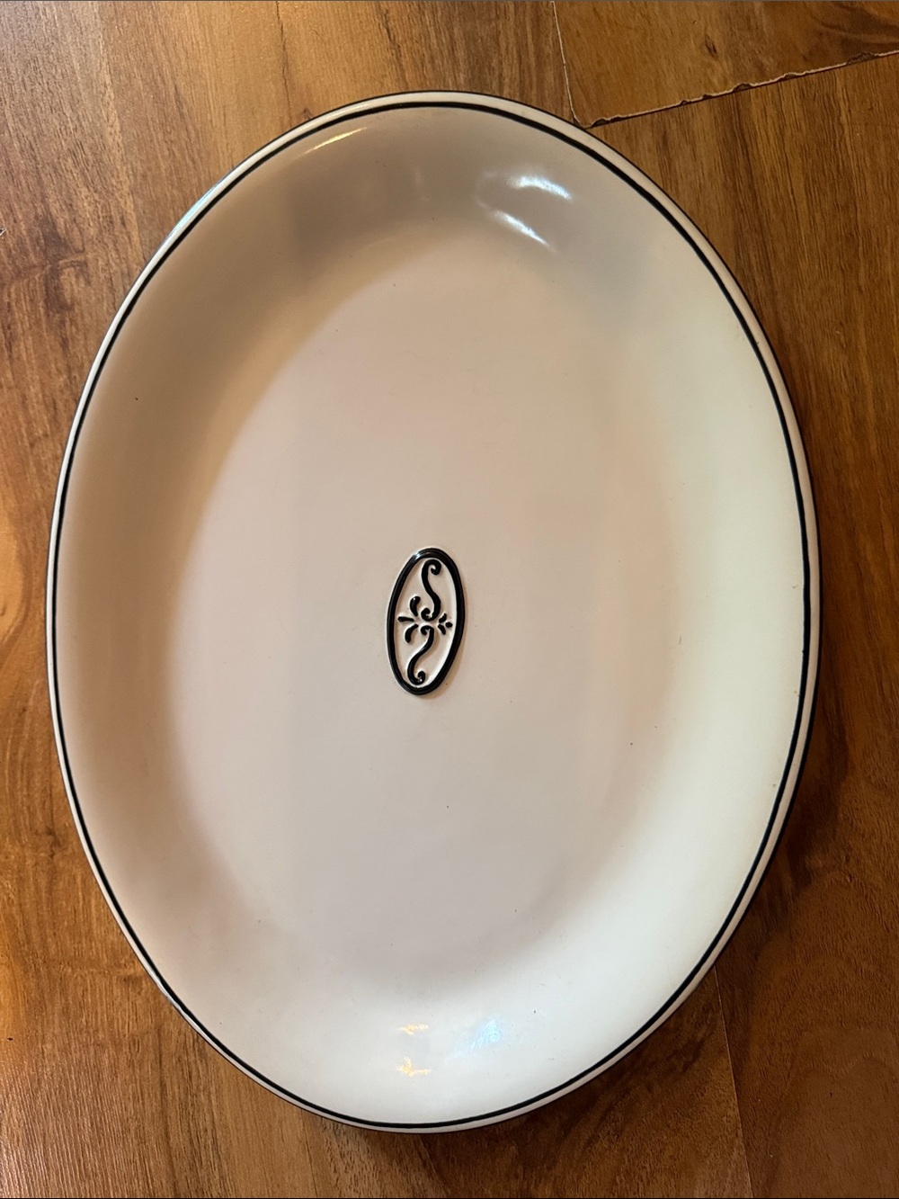 Elegant Cream Oval Serving Platter with Black Trim